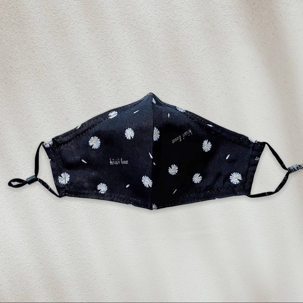 kiwi beast white daisy black adjustable strap adult face mask